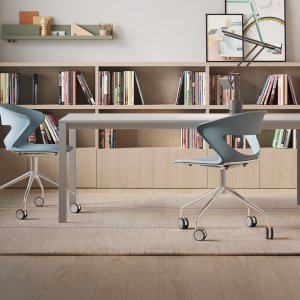 Brick Red shell of the Kicca chair seen from the back, showing the moulded curve