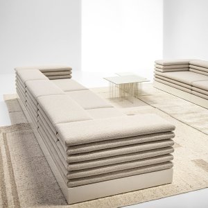 Corner composition of the Acamante modular sofa in a company lounge