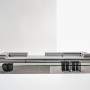 Sofas and lounge seating: Acamante two-seater with its base upholstered to match