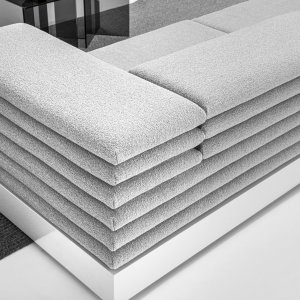 Square Acamante footstool placed in front of the LaCividina sofa