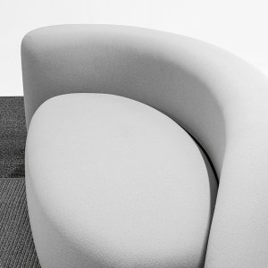 Two-way stretch fabric pulled taut over the rounded volume of Lisse