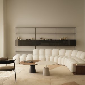 Curved Array pouf set against the backrest modules