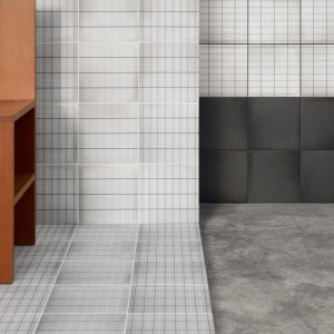 Shower wall in Aurore Light Blue Grid S designed by Vincent Van Duysen