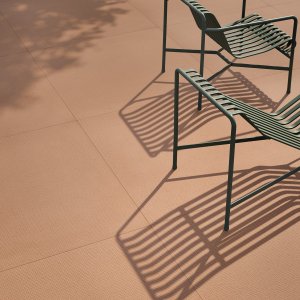 Meeting room floored with Pico porcelain stoneware by Mutina