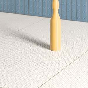 Close-up of the raised dots on Pico Up Natural porcelain