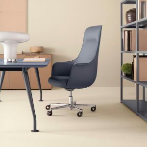 Rounded armrest opening slightly outwards on a Not Guilty chair
