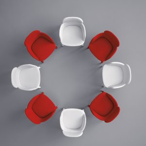 Ester 693 pouf, 42 cm square, beside a lounge chair