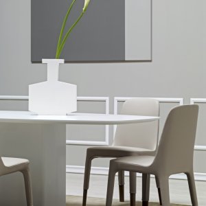 Four leg finishes of Ester: titanium, nickel, bronze, antique brass