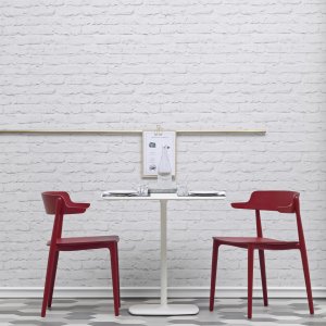 The curved plywood backrest of the Nemea