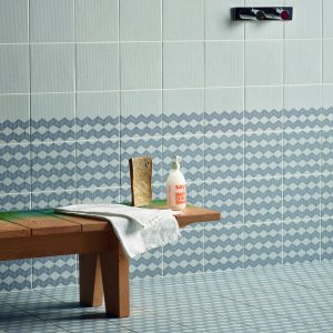Interior with Tape by Mutina half pattern transition between two areas