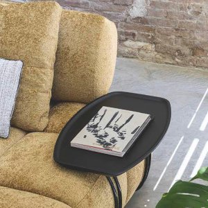 Qubik pouf 100 x 100 cm beside a sofa