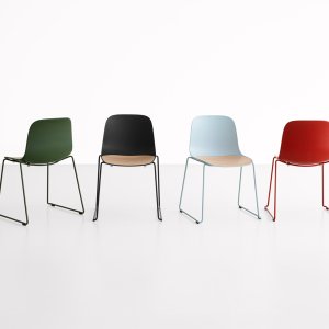 Seela chair with solid wood legs in a meeting room