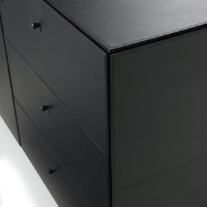 Cabinet sides covered in black saddle leather