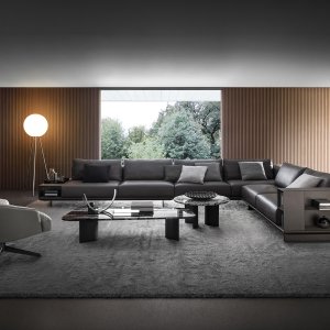 Asso modular sofa by i4Mariani with a side bookcase module instead of the right armrest