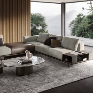 Leather covered base of the Asso sofa on titanium painted steel feet
