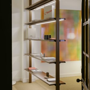 Floor to ceiling Cosmos bookshelf with under-shelf lighting