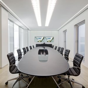 Nomos table with ultra-clear back-painted glass top