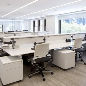 Shared Nomos bench with intermediate screens and upper shelves