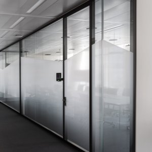 Videoconference monitor integrated into a W80 wall