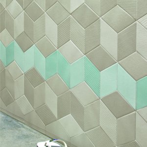 Breakout space with a Tex wall in Blue and oak tables