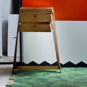 Tex rhombus tiles by Mutina in Olive with knitted relief textures on a wall