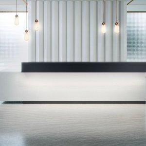 Reception desk Toki by Archiutti with bleached oak front and metallic brown raised unit