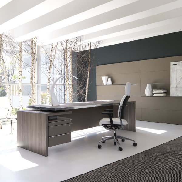 IVM Office glass partition system dividing a modern workspace