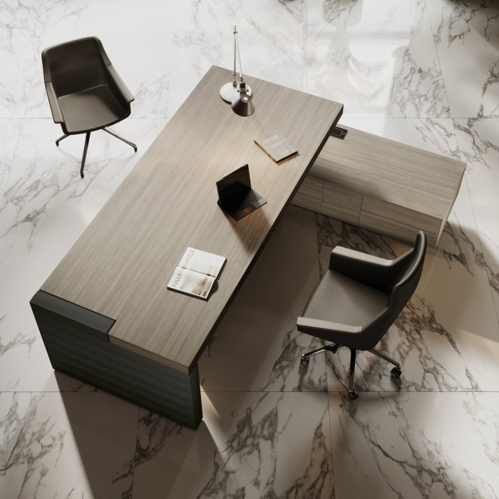 Large executive desk in a UK leadership office with clean proportions, discreet cable management and a guest-facing front panel